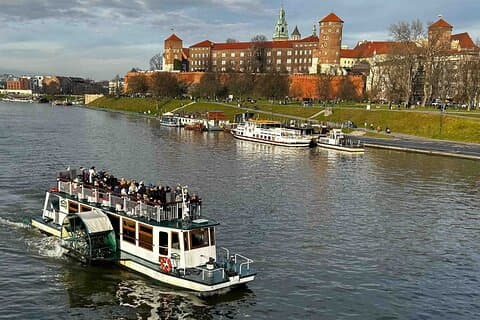 Explore Krakow's historical landmarks from the comfort of a ship's deck, enveloped in a relaxing atmosphere. Drift peacefully along the Vistula River, soaking in the serene views of the city.
