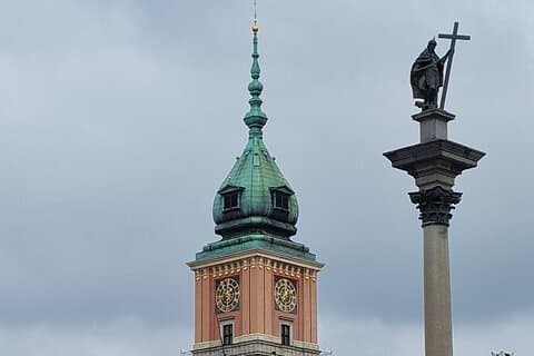 Royal Castle Clock Tower and the statue of king Sigismund III Vaza