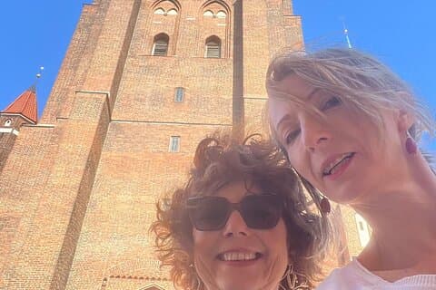 The tallest tour in town does not get in a horizontal picture ;) The St. Mary church is still the biggest brick church in the world.