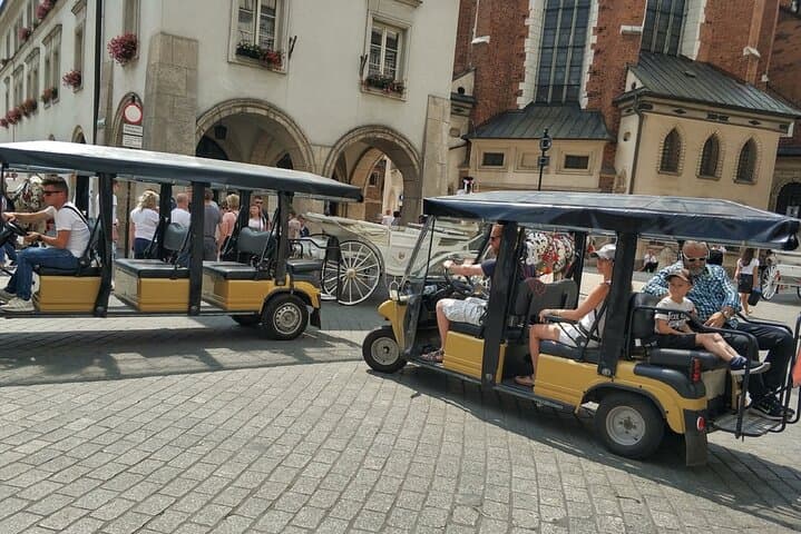 A glance at the Krakow Old Town from the deck of a electric golf cart