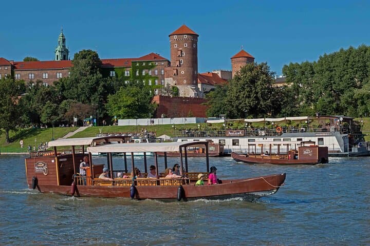 Traditional wooden gondola, a masterpiece crafted by Polish artisans. This 12-passenger vessel is a testament to the enduring legacy of Poland's boat-making traditions.