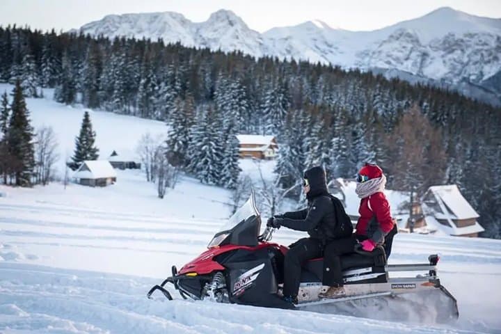 From Zakopane: Tour with Snowmobiles, Cable Car & Hot Springs