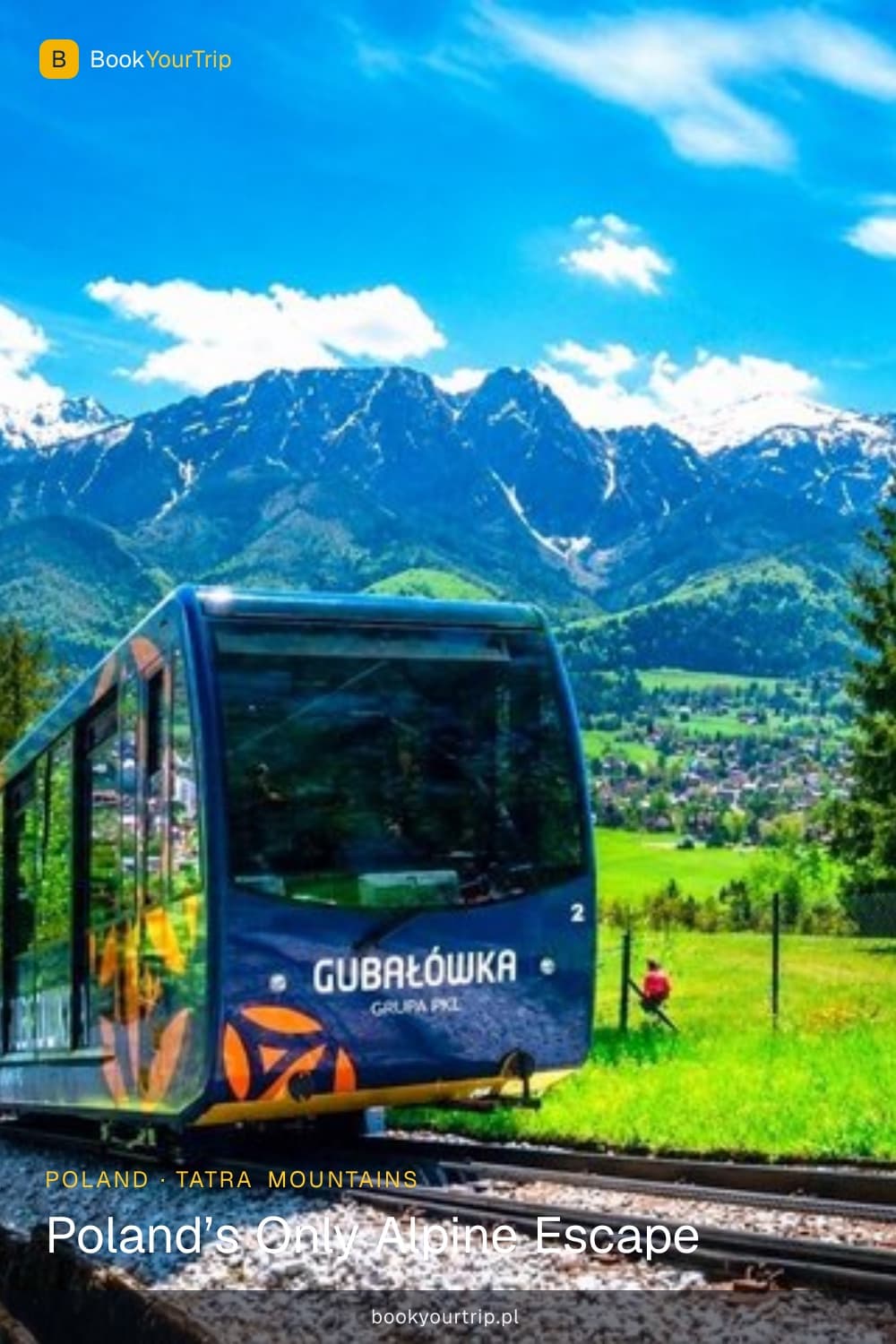 Wooden Zakopane buildings and the Tatras behind — a day from Kraków