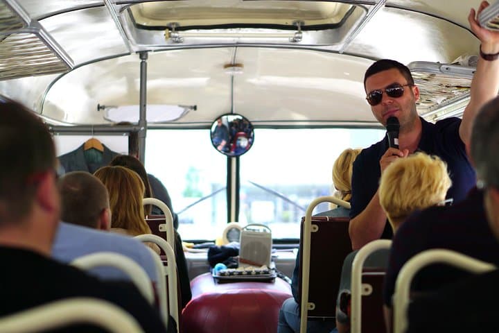 Guide in the retro bus